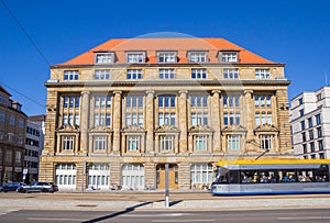 Tram in front of a historic building in Leipzig