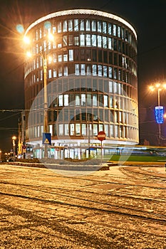 Tram at the intersection of streets at night