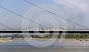 Tram mouving on Oberkasseler bridge in Dusseldorf