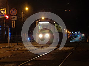 Tram on the night street.