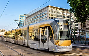 Tram on Place Poelart in Brussels photo