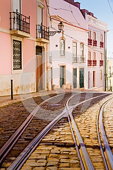 Tram rails in Alfama, Lisbon, Portugal photo