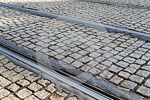 Tram rails laid cobblestones on the streets of Prague