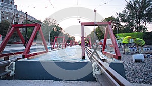 Tram rails at the stage of their installation and integration into concrete plates on the road timelapse hyperlapse.