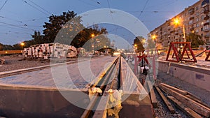 Tram rails at the stage of their installation and integration into concrete plates on the road timelapse hyperlapse.