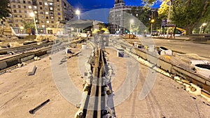 Tram rails at the stage of their installation and integration into concrete plates on the road timelapse hyperlapse.