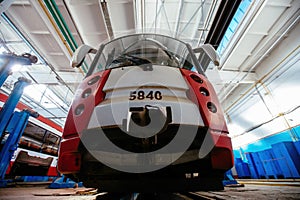 Tram in service depot. Maintenance and repairing of trams