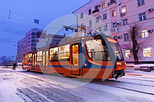 Tram in the street of winter city of Khabarovsk