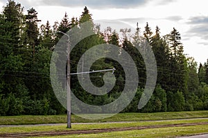 Tram track rails among green grass closeup