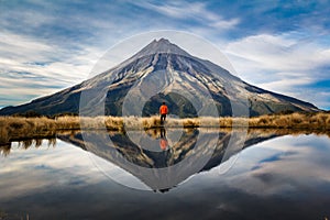 A tramper in mount taranaki, new zealand