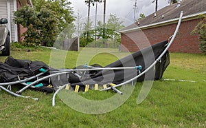 Trampoline twisted and mangled after storm