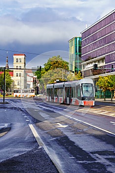 Trams in Tallinn city on cloudy day after raining,