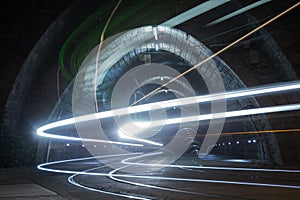 Tramway Tunnel at Night with Tram Light Trails