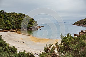 Tranquil beach at Harold Bay in Stewart Island or Rakiura, New Zealand.