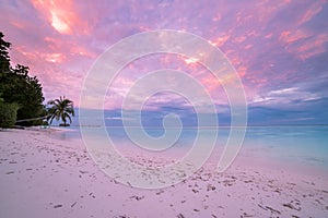 Tranquil beach sunset scene. Exotic tropical beach landscape for background. Design of summer vacation holiday concept