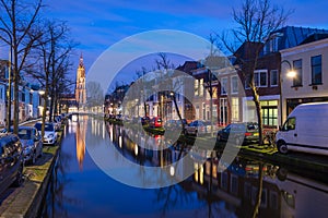 Tranquil evening by the canal in the city of Delft