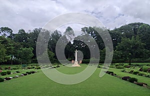 Tranquil Garden with Memorial Cross photo