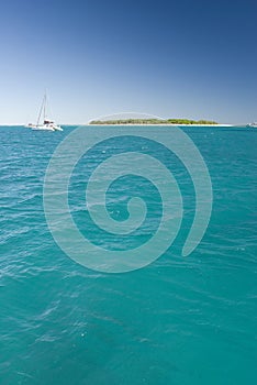 Tranquil island on ocean horizon