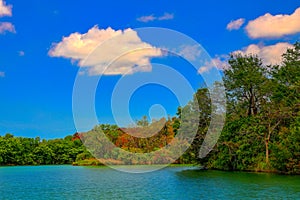 Tranquil lakeside scenery and cloudscape at Chengching Lake