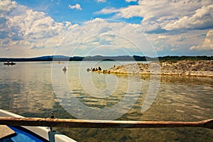 Tranquil lakeside scenic view from boat