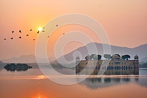 Tranquil morning at Jal Mahal Water Palace at sunrise in Jaipur. Rajasthan, India