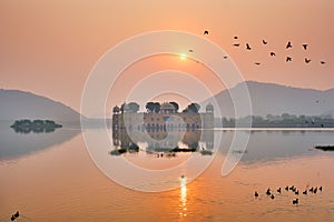 Tranquil morning at Jal Mahal Water Palace at sunrise in Jaipur. Rajasthan, India