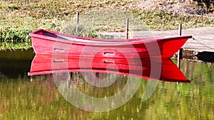 Tranquil morning red canoe on lake, HD 1080P