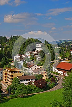 Tranquil peaceful view of residence residential houses with winding road in Lucerne, Switzerland with Swiss typical home buildings