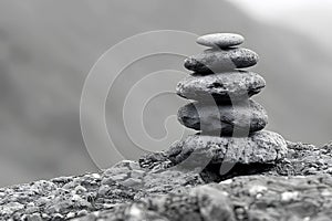 Serene Balance of Stacked Stones in Nature Generative AI photo