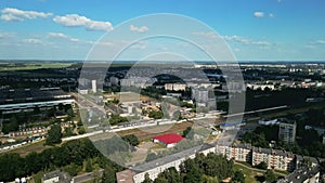 Tranquil suburbs in a big city. Multi-storey buildings and a large green area. Panoramic photo. Aerial photography