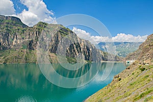 Tranquility: Scenic Blue Lake Reflecting the Majestic Mountains and Sky