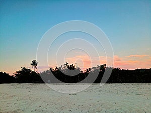 Tranquilizing sunset view at the beachfront photo