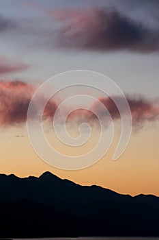 Tranquillity view sunset sky against mountain silhouette