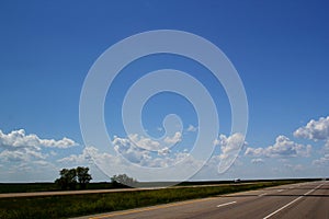 Trans-Canada Highway heading west of Calgary, Alberta, Canada - An Endless road / journey / roadtrip / adventure photo