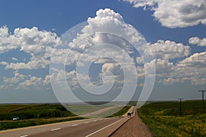 Trans-Canada Highway heading west of Calgary, Alberta, Canada - An Endless road / journey / roadtrip / adventure photo