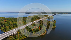 Transcanada highway, Lake of Two Mountains Bridge and fall season colors in the outskirts of Montreal