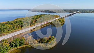 Transcanada highway, Lake of Two Mountains Bridge and fall season colors in the outskirts of Montreal