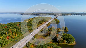 Transcanada highway, Lake of Two Mountains Bridge and fall season colors in the outskirts of Montreal