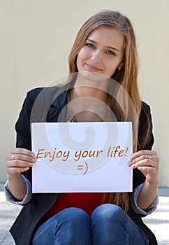 Transcription.Record.Note.Enjoy your life.Beautiful,cute,nice,pretty blonde girl with long,straight hair.