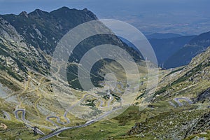 Transfagarasan - High altitude winding road in Carpathians mountains panorama. Aerial view.