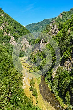 Transfagarasan landscape - river crossing through the mountains - Romania