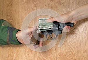 Transfers of money in exchange for a gun under certain conditions