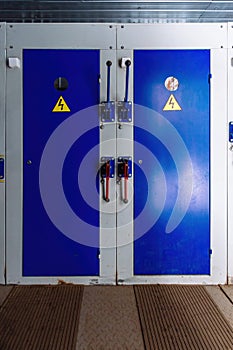 Transformer box. Locked metal doors of switchgear cabinets