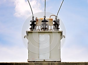 Transformer substation against a blue sky