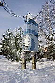 Transformer substation on outskirts of village, winter time has come
