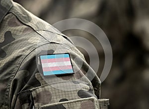 Transgender Pride Flag on military uniform. Integration, Discrimination. Collage