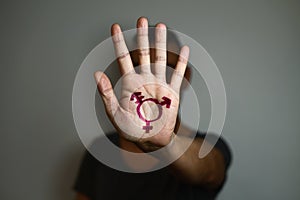 Transgender symbol in the palm of the hand