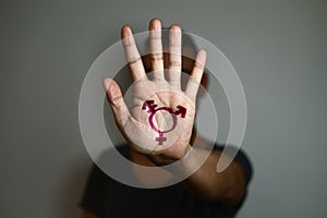 Transgender symbol in the palm of the hand photo