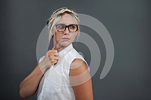 Transgender woman with hairstyle looking away