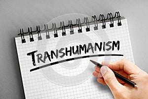 Transhumanism text on notepad, concept background photo